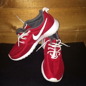A pair of Nike Roshe sneakers